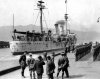 HMS PHILOMEL berthing at Ferry Wharf, Wellington, 1917..jpg